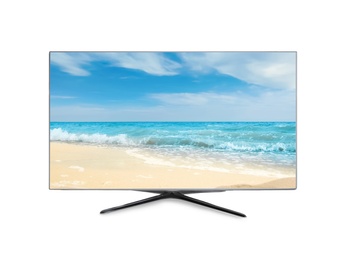 Modern wide screen TV monitor showing ocean and sandy beach, isolated on white