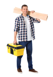 Handsome carpenter with wooden planks and tool box isolated on white