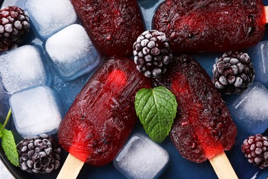Tasty blackberry ice pops, closeup. Fruit popsicle