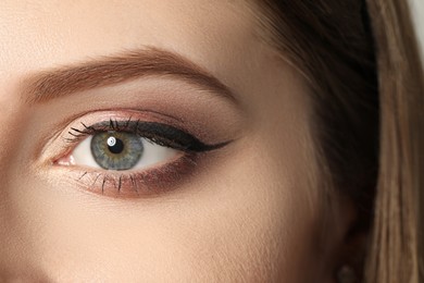 Young woman with beautiful eyebrows, closeup view