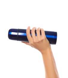 Woman holding blue thermos on white background, closeup