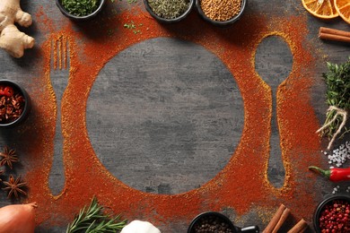 Photo of Flat lay composition with different spices, silhouettes of cutlery and plate on grey table. Space for text