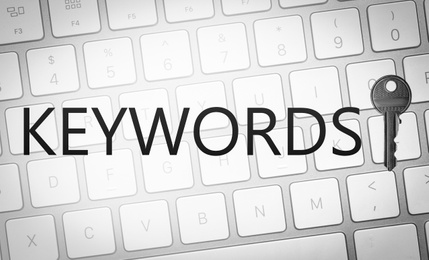 Word Keywords, key and computer keyboard. SEO direction
