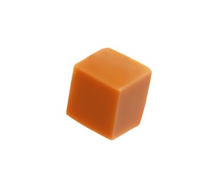 One caramel cube isolated on white. Confectionery