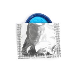 Torn condom package isolated on white, top view. Safe sex