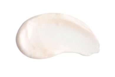 Sample of face cream on white background, top view