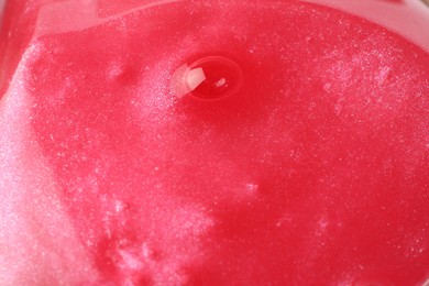Photo of Closeup view of red slime. Antistress toy