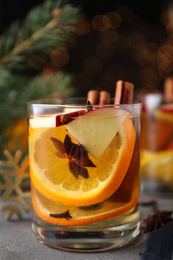 Aromatic white mulled wine on light grey table