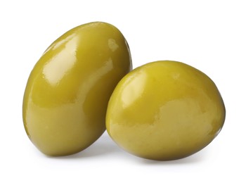 Two fresh green olives on white background