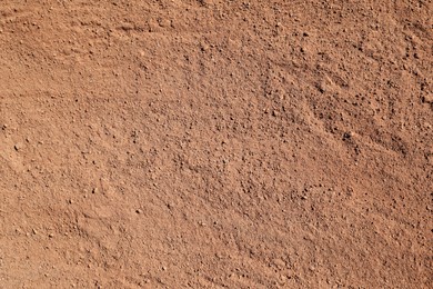 Textured ground surface as background, top view