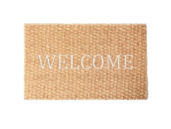 Door mat with word WELCOME isolated on white, top view