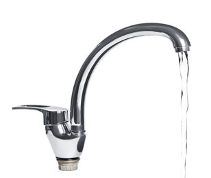 Water stream flowing from tap on white background