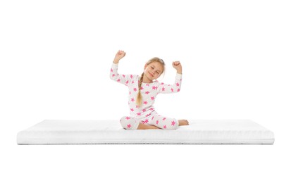 Photo of Little girl waking up on mattress against white background