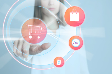 Online shopping. Woman touching button with cart illustration on virtual screen, closeup