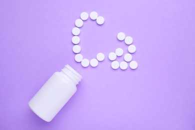 Symbol Ca (Calcium) made of pills and medical bottle on violet background, top view