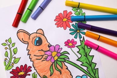 Child's colored drawing with felt tip pens, flat lay