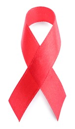Photo of Red ribbon isolated on white, top view. World Cancer Day