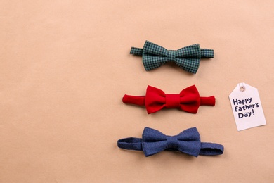 Bow ties on color background. Father's day celebration