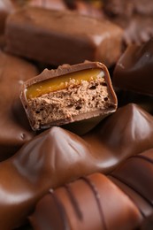 Heap of tasty chocolate bars, closeup view