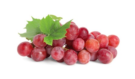 Cluster of ripe red grapes with green leaves on white background