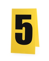 Yellow crime scene marker with number five on white background
