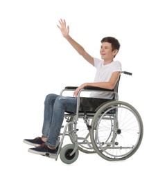 Teen boy in wheelchair on white background