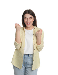 Portrait of excited young woman on white background