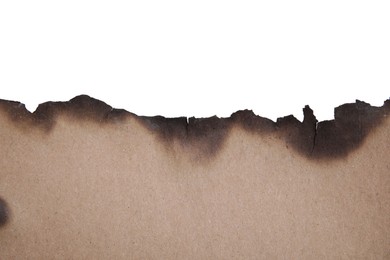 Piece of brown paper with dark burnt borders on white background, top view. Space for text