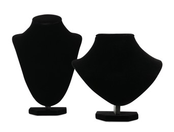 Photo of Different empty black velvet jewelry stands on white background