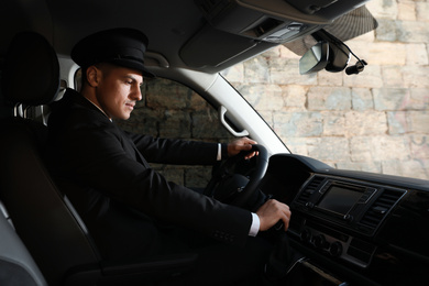 Professional driver in luxury car. Chauffeur service