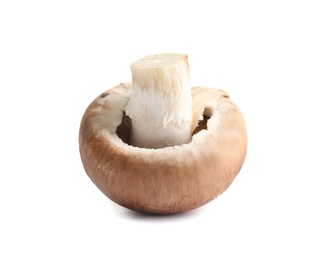 Photo of Fresh whole champignon mushroom isolated on white
