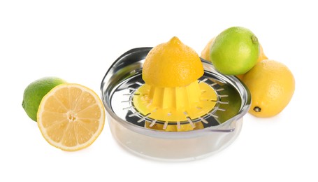 Metal juicer, fresh lime and lemons on white background