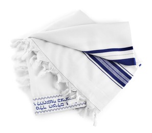 Tallit with text Blessed are You, Lord our God, King of the universe, who has sanctified us with His commandments, and commanded us to enwrap ourselves in Tzitzit in Hebrew isolated on white, top view. Garment for Rosh Hashanah celebration