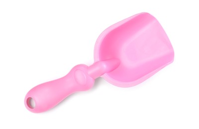 Pink plastic toy shovel isolated on white, top view
