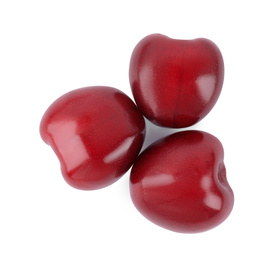 Tasty ripe red cherries isolated on white, top view