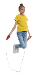 Cute little girl with jump rope on white background