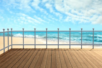 Image of Outdoor wooden terrace revealing picturesque view on ocean shore