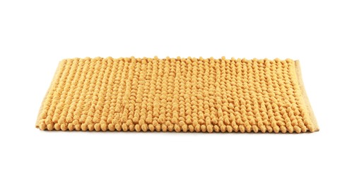 New yellow bath mat isolated on white