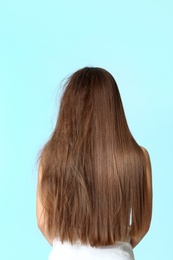 Photo of Woman before and after hair treatment on color background