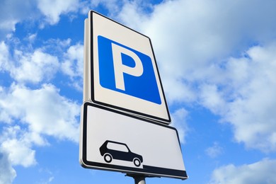 Photo of Traffic sign PARKING outdoors, low angle view