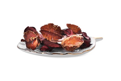 Photo of Many different scented potpourri in holder isolated on white