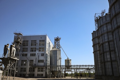 Photo of View of modern granaries for storing cereal grains outdoors