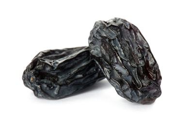 Tasty raisins on white background. Healthy dried fruit