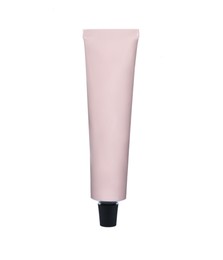 Light pink tube of hand cream isolated on white. Mockup for design