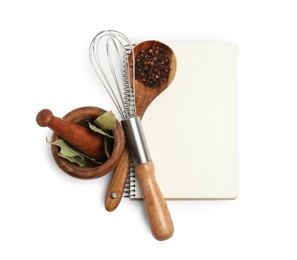 Blank recipe book, spices and kitchen utensils on white background, top view. Space for text
