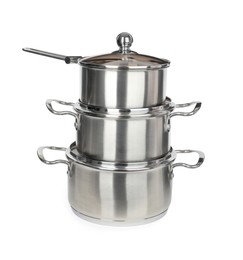 Stainless steel cookware set on white background