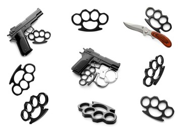 Set with black brass knuckles, guns and knife on white background