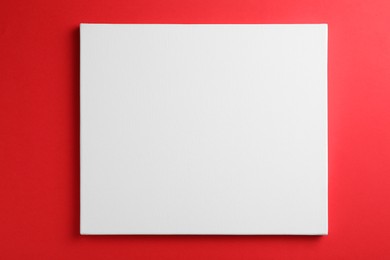 Blank canvas on red background, space for text
