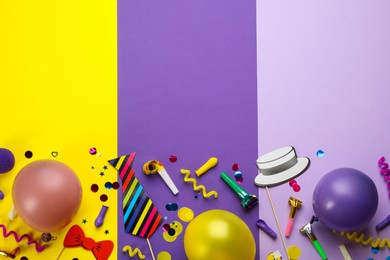 Flat lay composition with carnival items on color background. Space for text