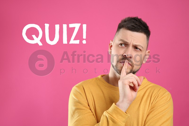 Thoughtful man and word QUIZ on pink background 